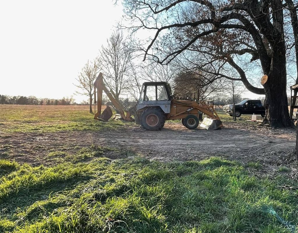 Bulldozer clearing brush and trees on rural Kaufman County land